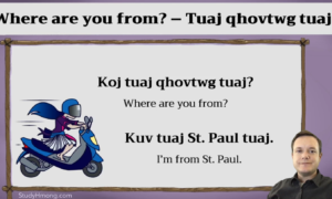 A Hmong language lesson slide with the phrase “Where are you from?” and its translation, plus a scooter illustration and a presenter in the corner.