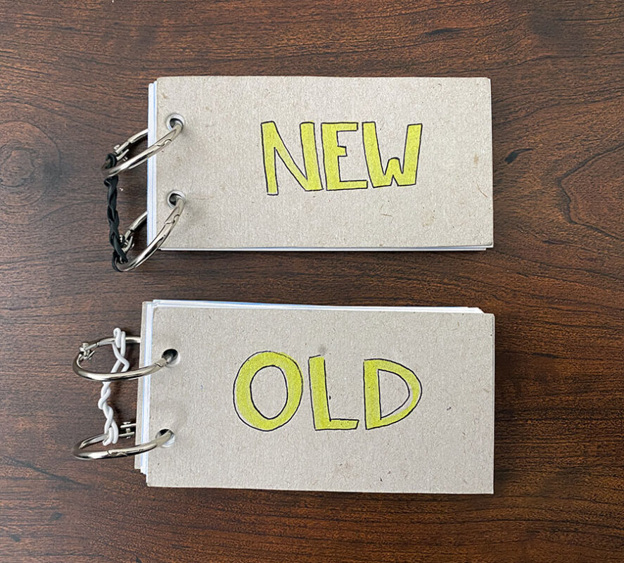 Photo of the finished flash card books: old and new.