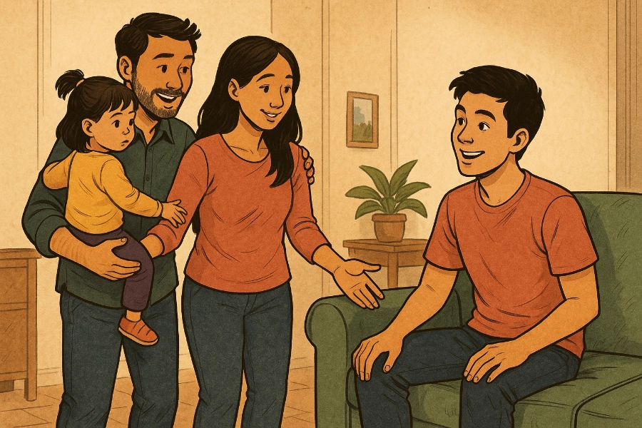 A smiling family of four gathers in a living room as a teen sits on a green couch and the parents with a young child greet him warmly.